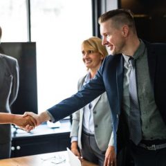 two people shaking hands