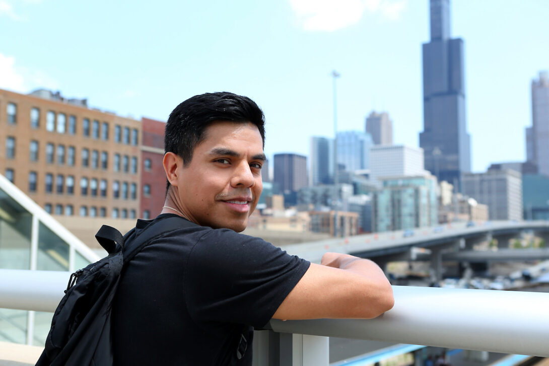 Student with city in background